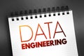 Data engineering - software engineering approach to designing and developing information systems, text concept on notepad Royalty Free Stock Photo