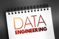 Data engineering - software engineering approach to designing and developing information systems, text concept on notepad