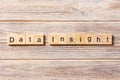 Data Insights word written on wood block. data Insights text on table, concept Royalty Free Stock Photo