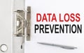 DATA LOSS PREVENTION text on the paper folder with pen. Business concept Royalty Free Stock Photo