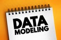 Data modeling - process of creating a data model for an information system by applying certain formal techniques, text concept on Royalty Free Stock Photo