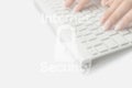 Data protecting security concept. Computer Internet protection symbol on blured keyboard background. Hacker attack and