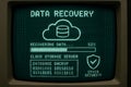 Data recovery on computer screen showing cloud storage server, database backup, and cybersecurity shield with binary code backdrop Royalty Free Stock Photo