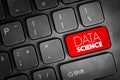 DATA SCIENCE text on keyboard key represents analytics discipline, information processing, statistical analysis, machine learning Royalty Free Stock Photo