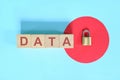 Data security and privacy protection concept. Data text on wooden blocks with metal padlock.