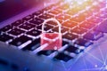 Data security systems computer with locked padlock on keyboard for protect crime by an anonymous hacker internet and data network