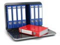 Data storage. Laptop with file ring binders. Royalty Free Stock Photo