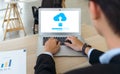 Data storage, networking and internet service concept. Back view of businessman using cloud drive technology upload save files to