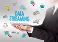 Data Streaming concept, young man holding a tablet computer Royalty Free Stock Photo