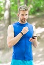 Data synchronization. digital sport. smart watch. athletic man in sportswear. outdoor workout. Fitness app. Ui ux Royalty Free Stock Photo