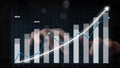Data visualization of financial growth on digital screen with human hands demonstrating keyboard input for business Royalty Free Stock Photo