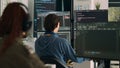 Database programer writing code on terminal window