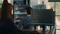 Database programer writing source code on terminal window with html script