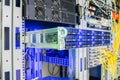 The database server on the skid is placed in the data center rack. Powerful computer equipment close-up. Hosting in a modern