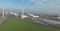 Datacenter in the Eemshaven, internet infrastructure building. Sustainable energy using wind turbines. Birds eye aerial