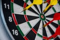 Datboard and some colorful darts Royalty Free Stock Photo