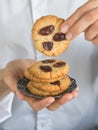 Date cookies held by a womans hand Royalty Free Stock Photo