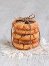 Tahini date cookies are stacked on a white wooden table Royalty Free Stock Photo