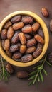 Date display Top view of dates in a wooden bowl