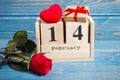 Date of 14 February on calendar, gift, red heart and rose flower, Valentines day concept