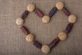 Date fruit and cookies form a heart shape on canvas