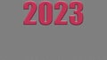 Date of the New Year 2023 Via Magenta colors on a perfect expensive gray background with small gold sequins