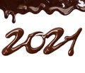 Date of the new year 2021 written by melted chocolate on a white background Royalty Free Stock Photo