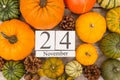 Date 24 november, thanksgiving, surrounded by pine apples and or