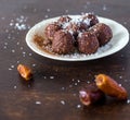 Date raw balls with coconut and cocoa Royalty Free Stock Photo