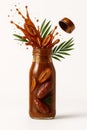 Date syrup splash exploding from glass bottle with palm leaves and floating cap on white Royalty Free Stock Photo