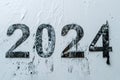 2024 date text on a distressed white wall background