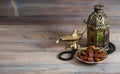 Dates, arabian lantern and rosary. Islamic holiday