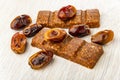 Dates, energy bars with dates and coconut on table