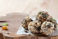 Dates energy homemade no cooked organic seeds nuts vegan oatmeal balls wooden rustic background