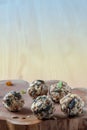Dates energy homemade no cooked organic seeds nuts vegan oatmeal balls wooden rustic and gradient blue background