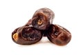 Dates isolate. Dates spill out from a cup in the shape of a heart on a white background close-up. Dried fruits Royalty Free Stock Photo