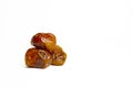 Dates isolated from bowl on white background