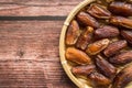 Dates or kurma on a wooden table