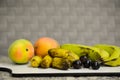 Dates, mangoes, Banana & Jambul or Malabar plum, hot summer fruits
