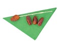 Dates with plastic stick, stem, on green paper napkin, serviette, isolated on white background. UK traditional Christmas