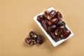 Dates in plate. Dried dates fruits