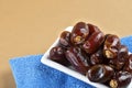 Dates in plate. Dried dates fruits