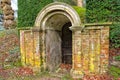 Iron gate in Georgian period ice house. Royalty Free Stock Photo