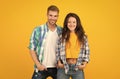 Dating couple of sensual woman and handsome man happy smiling together in casual fashion style yellow background, date Royalty Free Stock Photo