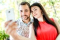 Dating young couple happy in love taking selfie