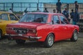 Datsun 510 with damaged rear bumper and taillights