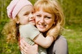 Daughter embraces mum Royalty Free Stock Photo