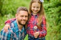 Daughter and father with dandelion. little girl and happy man dad. earth day. spring village country. ecology. Happy Royalty Free Stock Photo