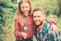 Daughter and father with dandelion. little girl and happy man dad. earth day. spring village country. ecology. Happy Royalty Free Stock Photo