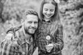 Daughter and father with dandelion. little girl and happy man dad. earth day. spring village country. ecology. Happy Royalty Free Stock Photo